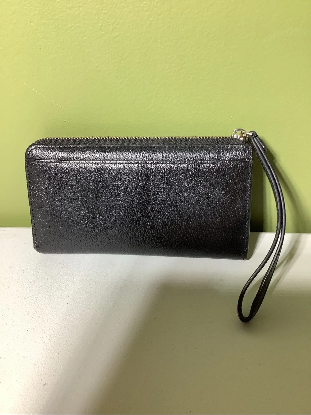 Kate Spade NY black zip around wristlet/wallet